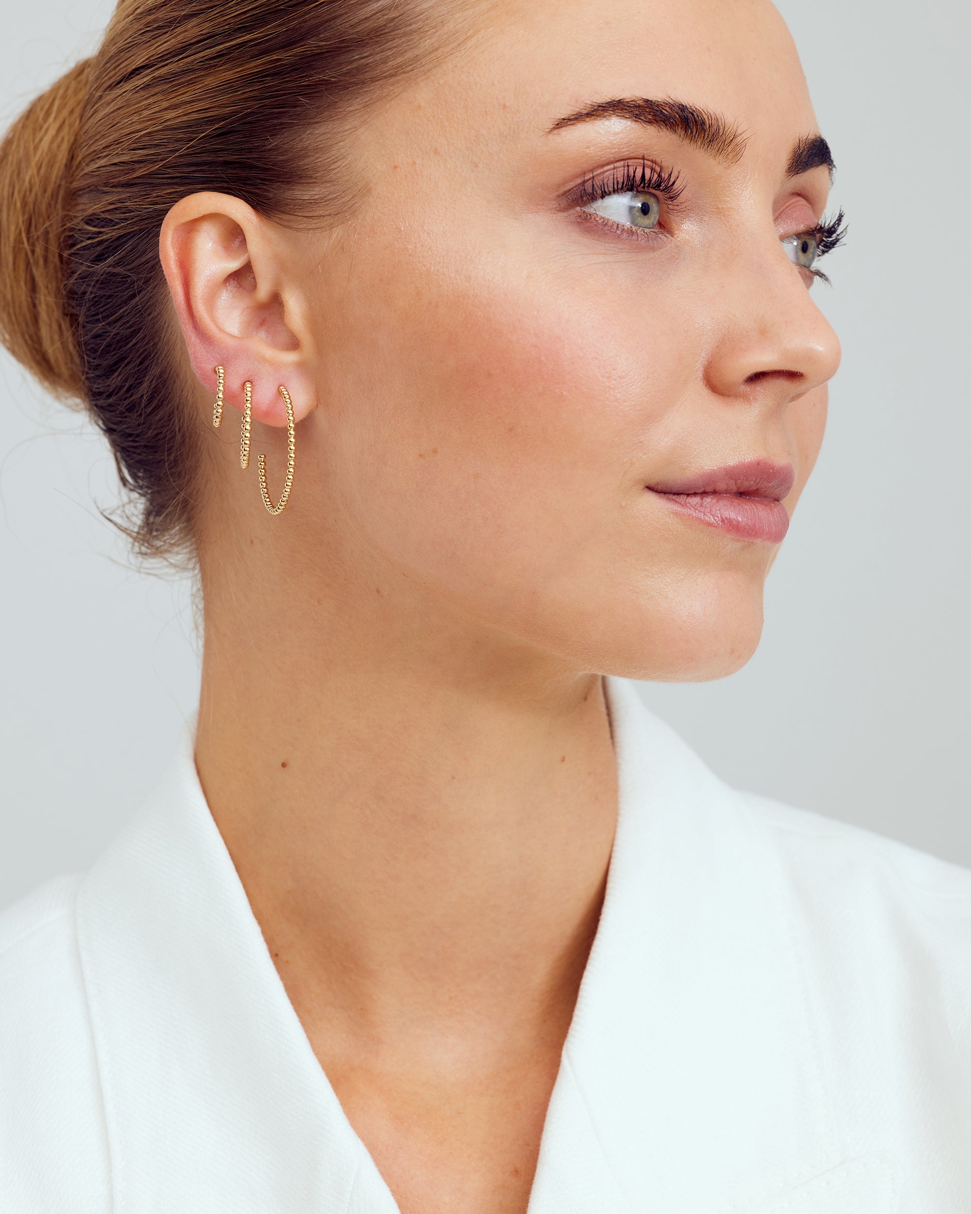 <tc>Smyckesset - Scarlett Halsband / Scarlett <!-- x-tinymce/html -->Örhängen / Scarlett Ring - 18 karat guldpläterad</tc>