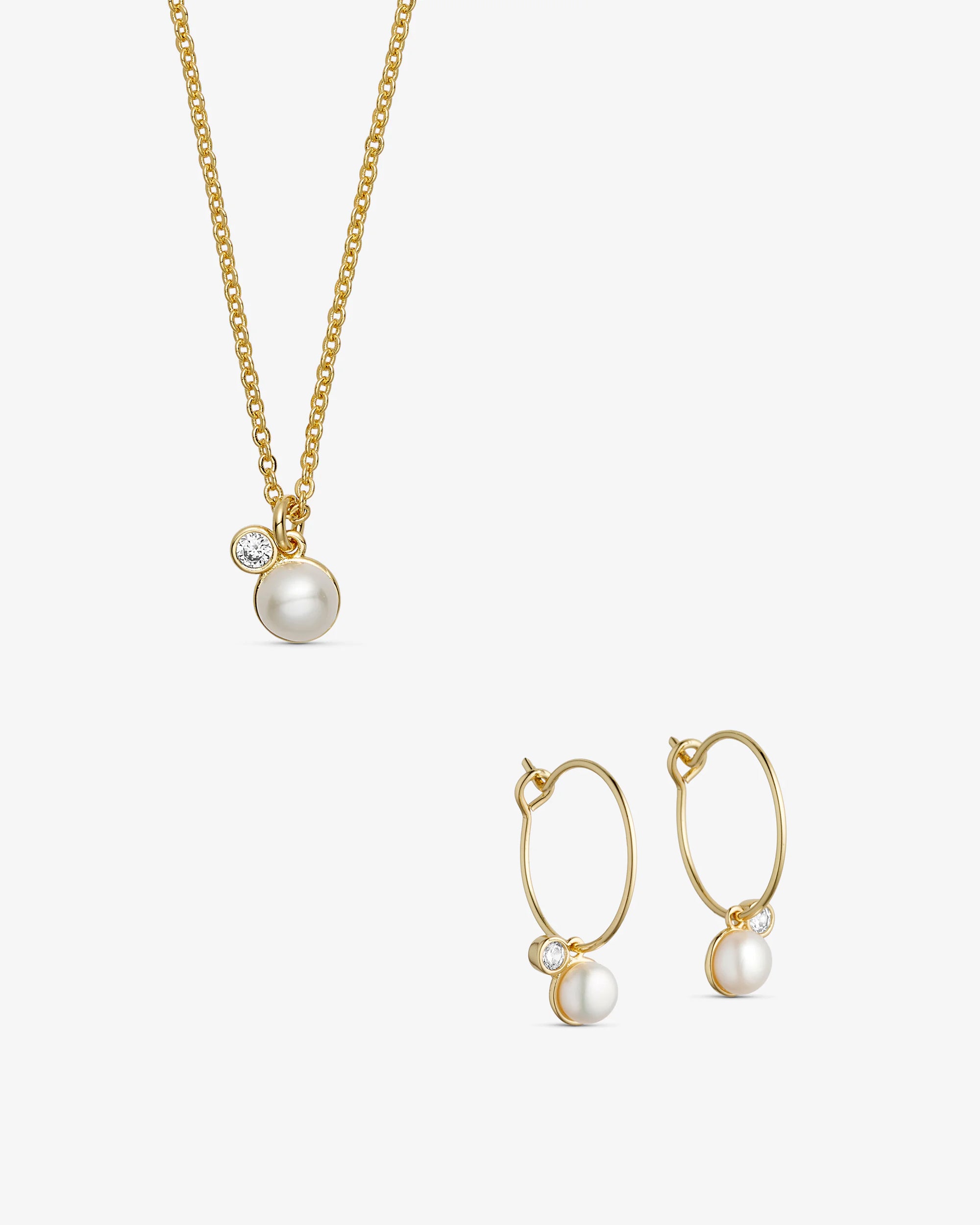 June Smykkesæt - Isola Halskæde / Isola Hoop Øreringe - 18 karat forgyldt